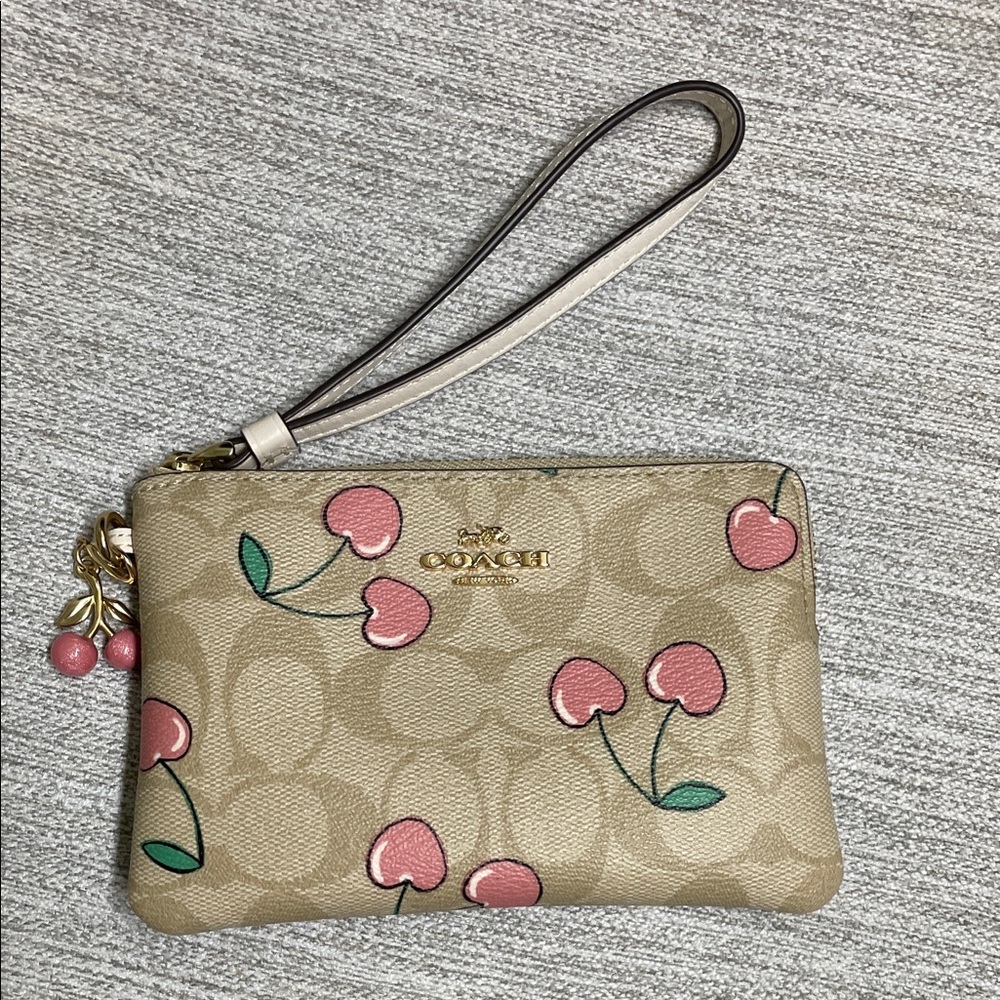 Coach Beige Wristlet with Pink Cherry Motif